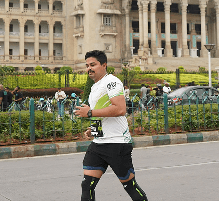 Mid-race past the old city buildings