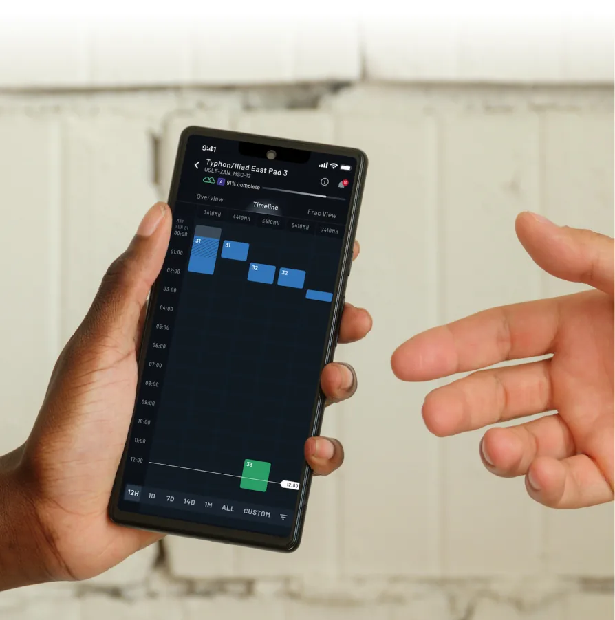 Timeline app on a phone being handed across